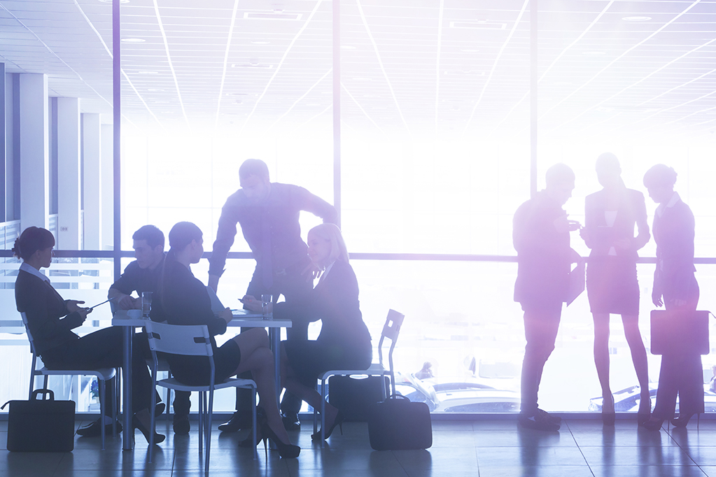  Silhouettes of businesspeople comunicating